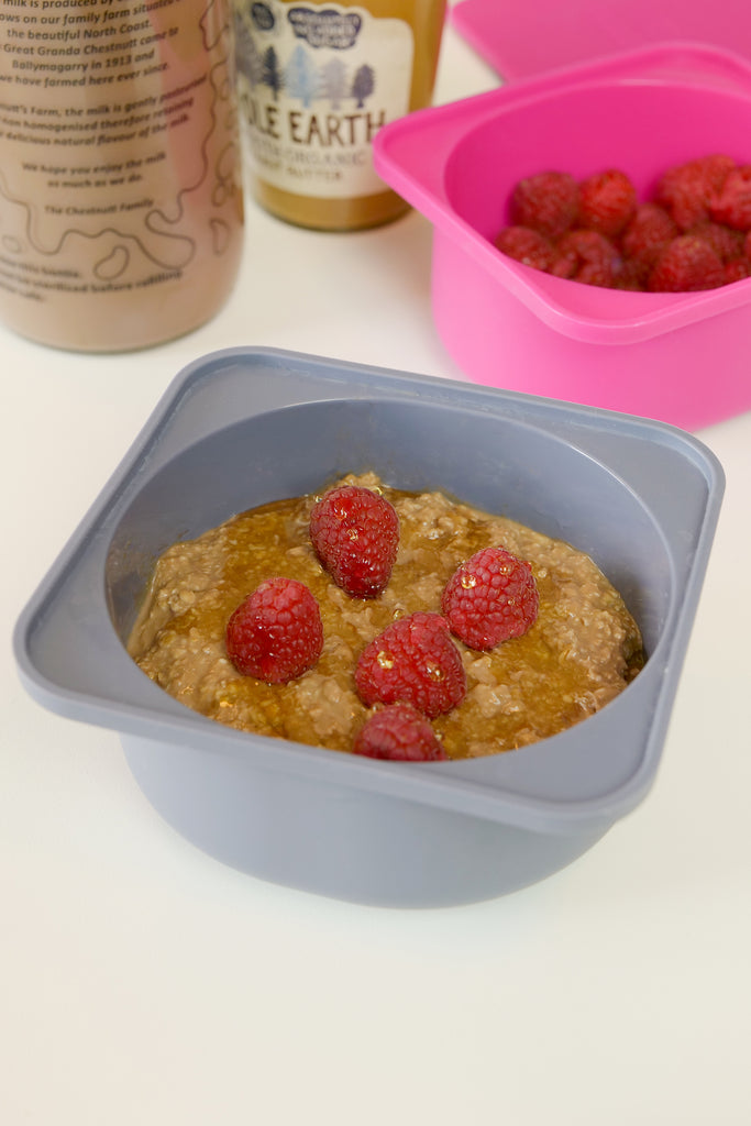 overnight oats in babadoh, topped with raspberries