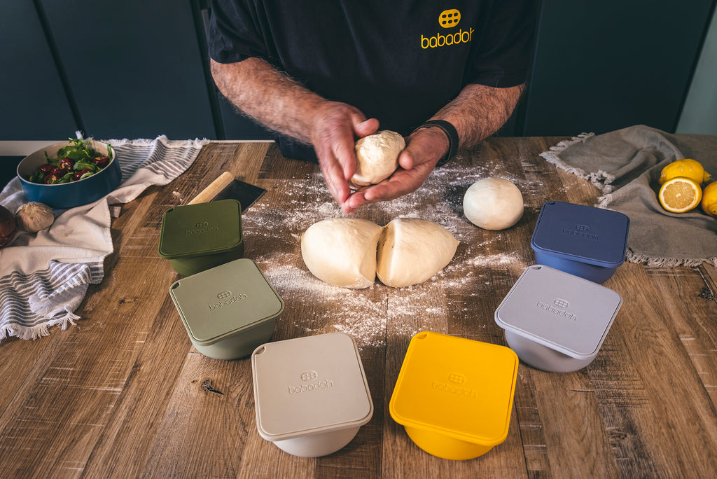 balling up pizza dough